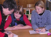 Jeannie Ferber with two students in a Russian village.
