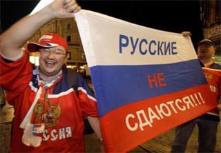 Russian Hockey Fans celebrate in Moscow after Russia won the 2008 world championship.