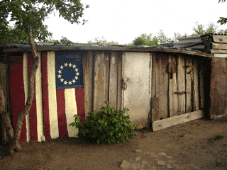 Art work by Garrett Pappas on a coal shed in rural Kazakhstan